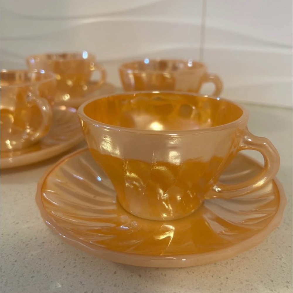 Anchor Hocking Peach Lustre Teacup and Saucer Set